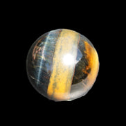 Blue Tigers Eye sphere 32mm 49g in sunlight - Rocks and Things Store