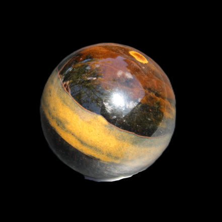 Blue Tigers Eye sphere 32mm 49g in sunlight - Rocks and Things Store