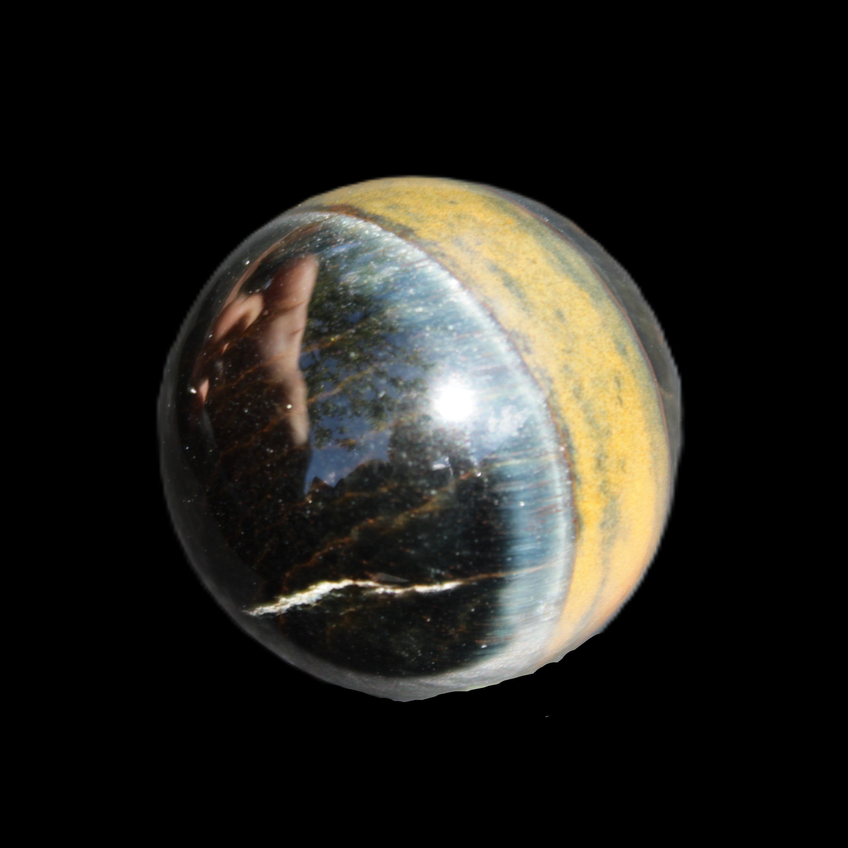 Blue Tigers Eye sphere 32mm 49g in sunlight - Rocks and Things Store