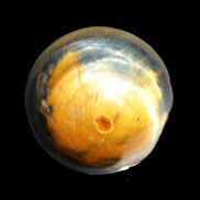 Blue Tigers Eye sphere 32mm 49g in sunlight - Rocks and Things Store