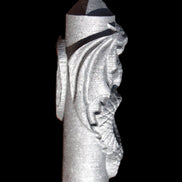 Imitation Shungite hand carved dragon 83g in sunlight - Rocks and Things Store