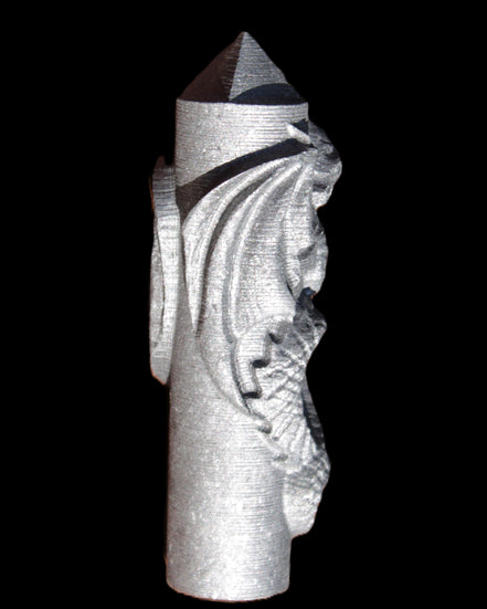 Imitation Shungite hand carved dragon 83g in sunlight - Rocks and Things Store