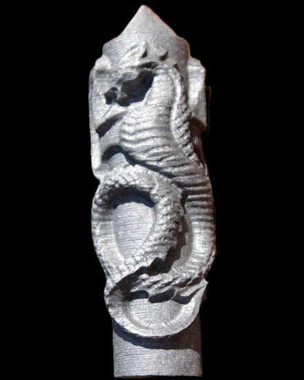 Imitation Shungite hand carved dragon 83g in sunlight - Rocks and Things Store