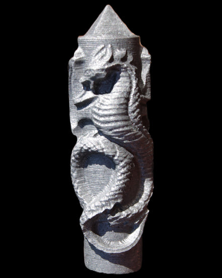 Imitation Shungite hand carved dragon 83g in sunlight - Rocks and Things Store