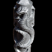 Imitation Shungite hand carved dragon 83g in sunlight - Rocks and Things Store