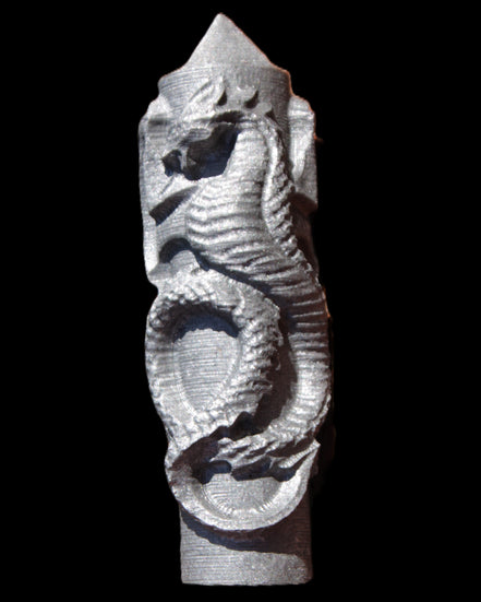 Imitation Shungite hand carved dragon 83g in sunlight - Rocks and Things Store