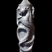 Imitation Shungite hand carved dragon 83g in sunlight - Rocks and Things Store