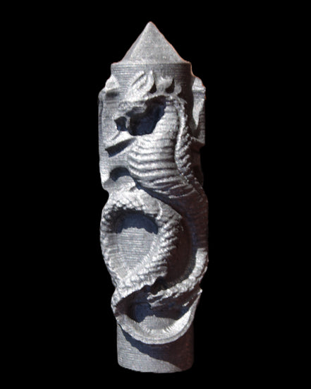 Imitation Shungite hand carved dragon 83g in sunlight - Rocks and Things Store