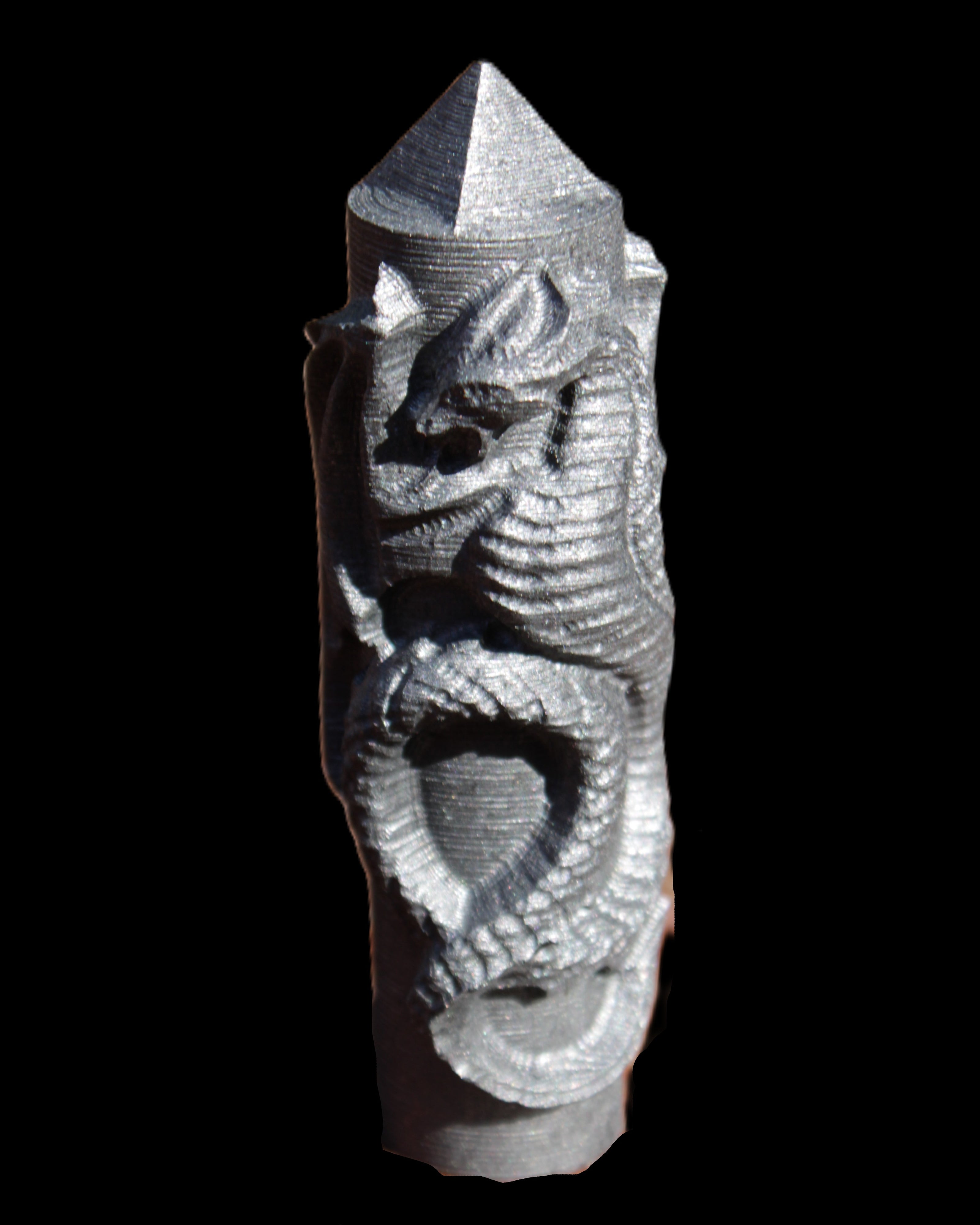 Imitation Shungite hand carved dragon 83g in sunlight - Rocks and Things Store