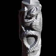 Imitation Shungite hand carved dragon 83g in sunlight - Rocks and Things Store