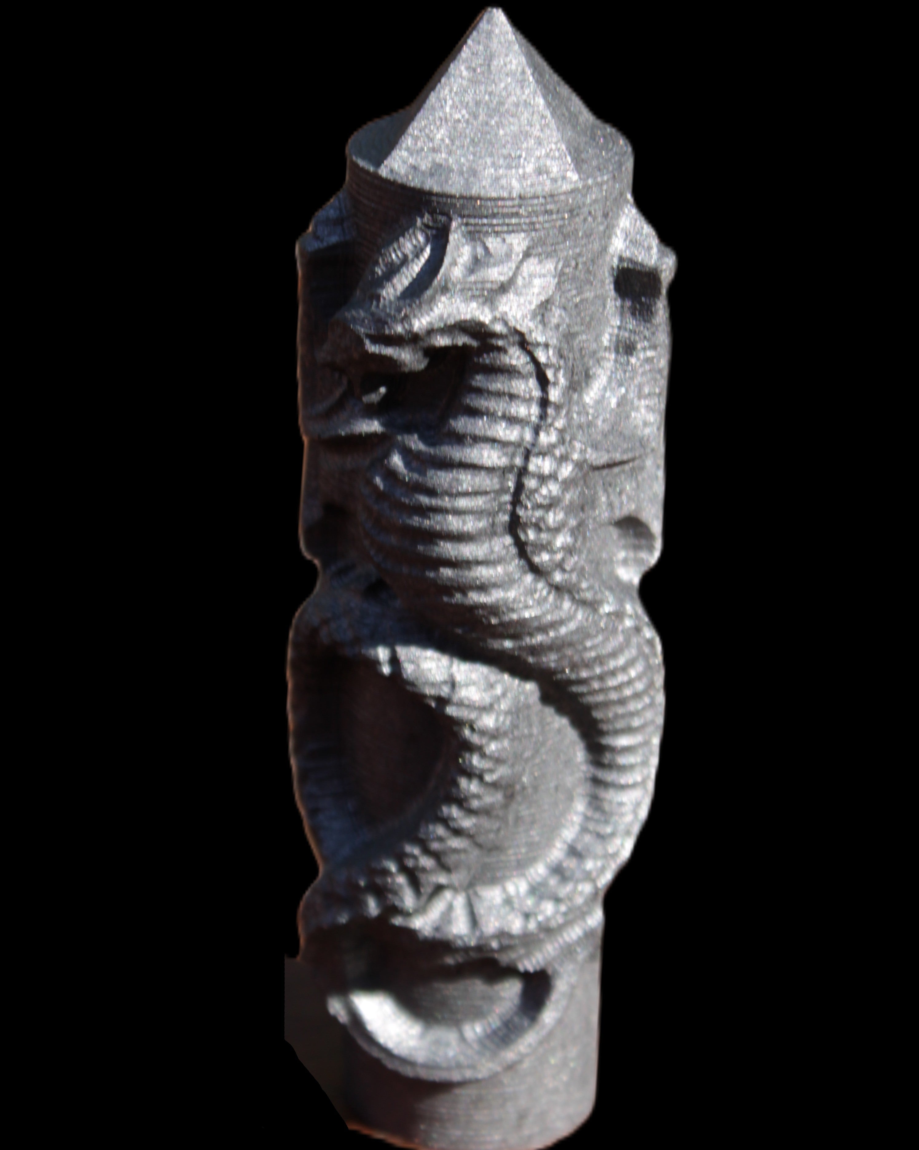 Imitation Shungite hand carved dragon 83g in sunlight - Rocks and Things Store