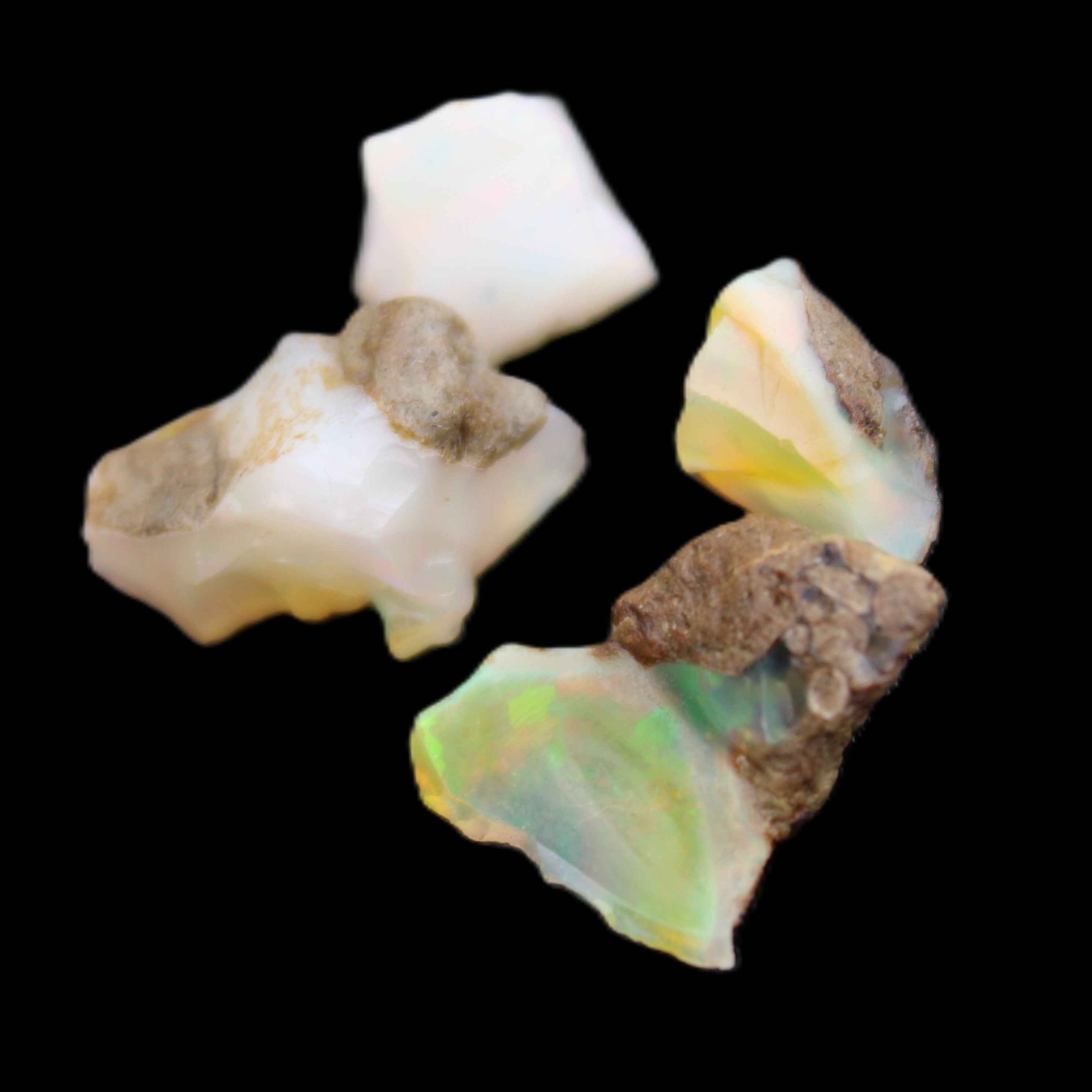 Natural Opal from Ethiopia 4 stones 8-9mm 13ct 2.6g in sunlight - Rocks and Things Store