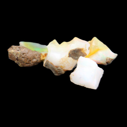 Natural Opal from Ethiopia 4 stones 8-9mm 13ct 2.6g in sunlight - Rocks and Things Store