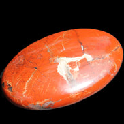 Red Jasper palmstone 56mm 45g in sunlight - Rocks and Things Store