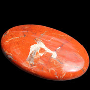 Red Jasper palmstone 56mm 45g in sunlight - Rocks and Things Store