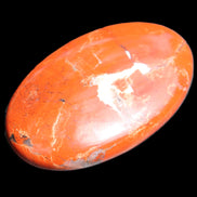 Red Jasper palmstone 56mm 45g in sunlight - Rocks and Things Store
