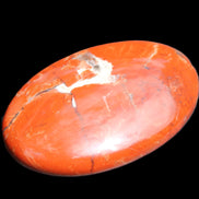 Red Jasper palmstone 56mm 45g in sunlight - Rocks and Things Store