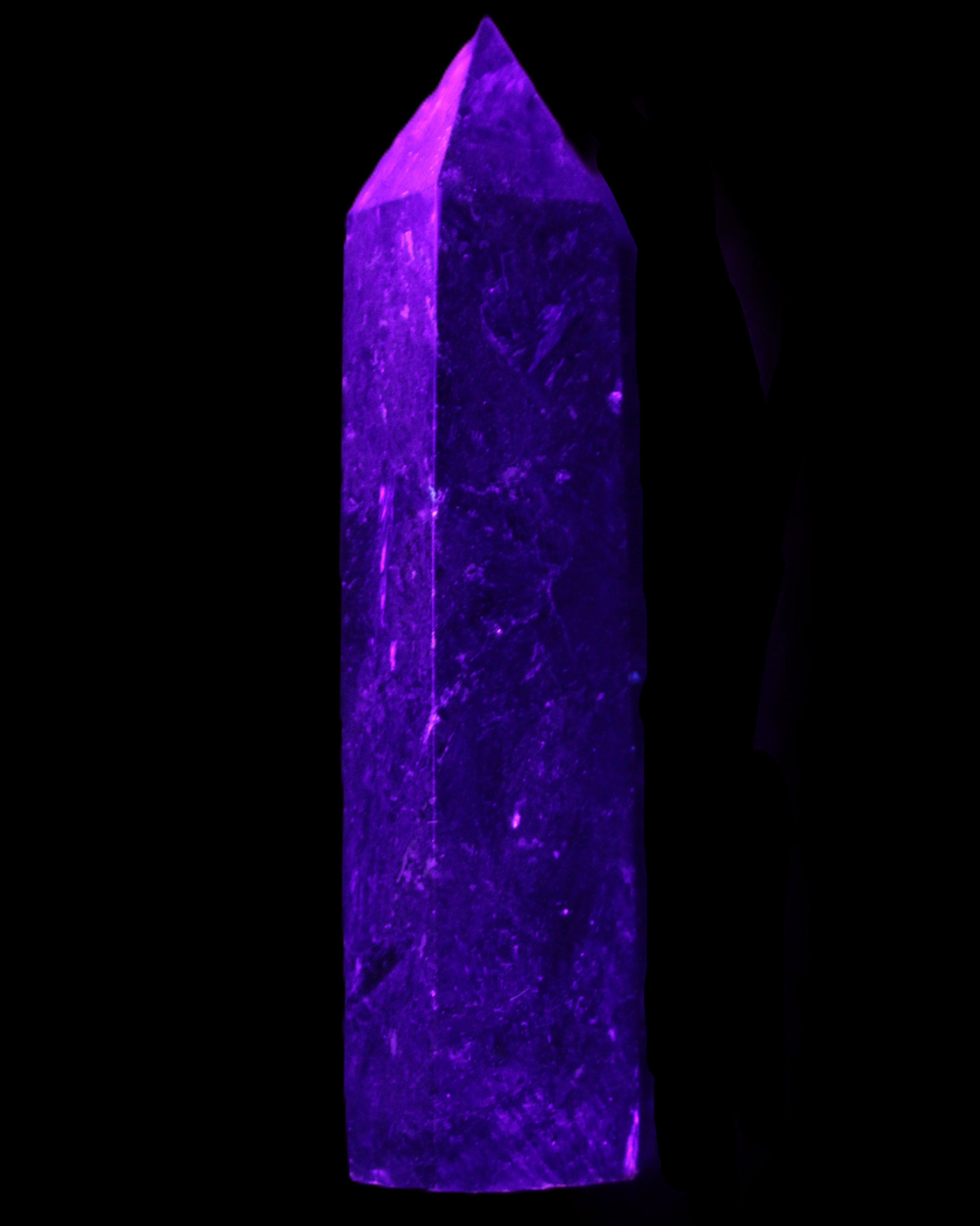 Astrophyllite wand 88mm 100g in UV light - Rocks and Things Store