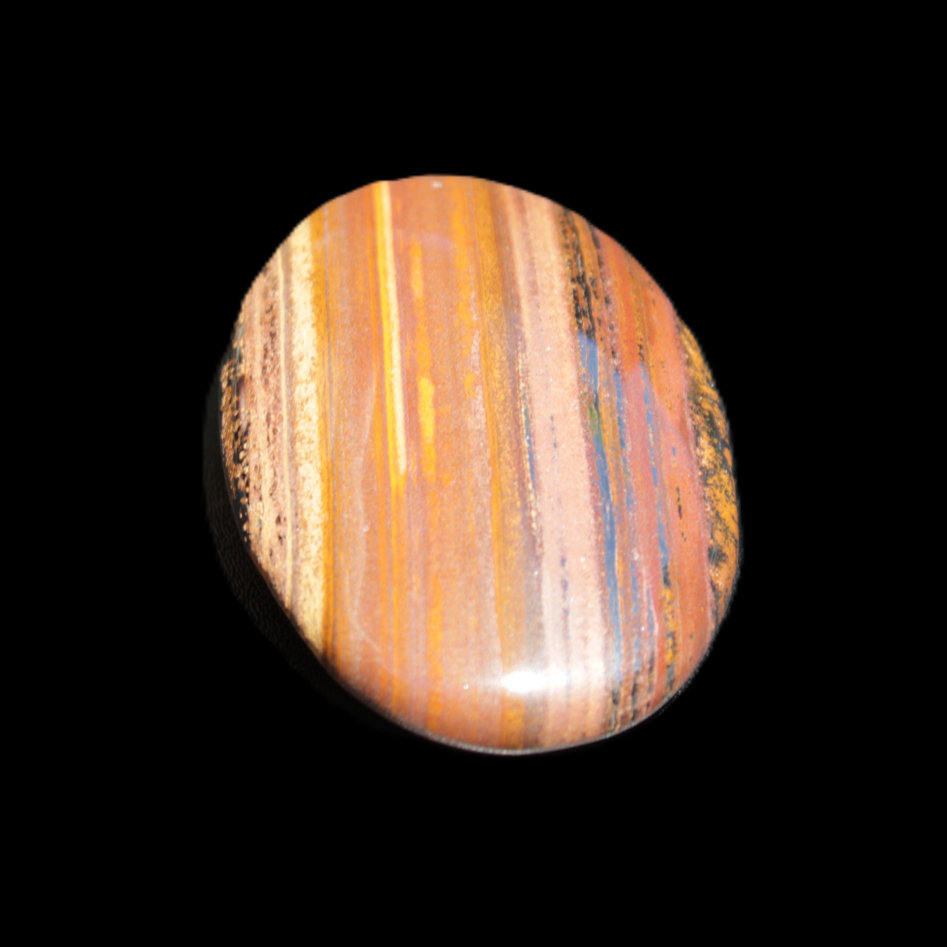 Red Tigers Eye palmstone 57mm 50g in sunlight - Rocks and Things Store