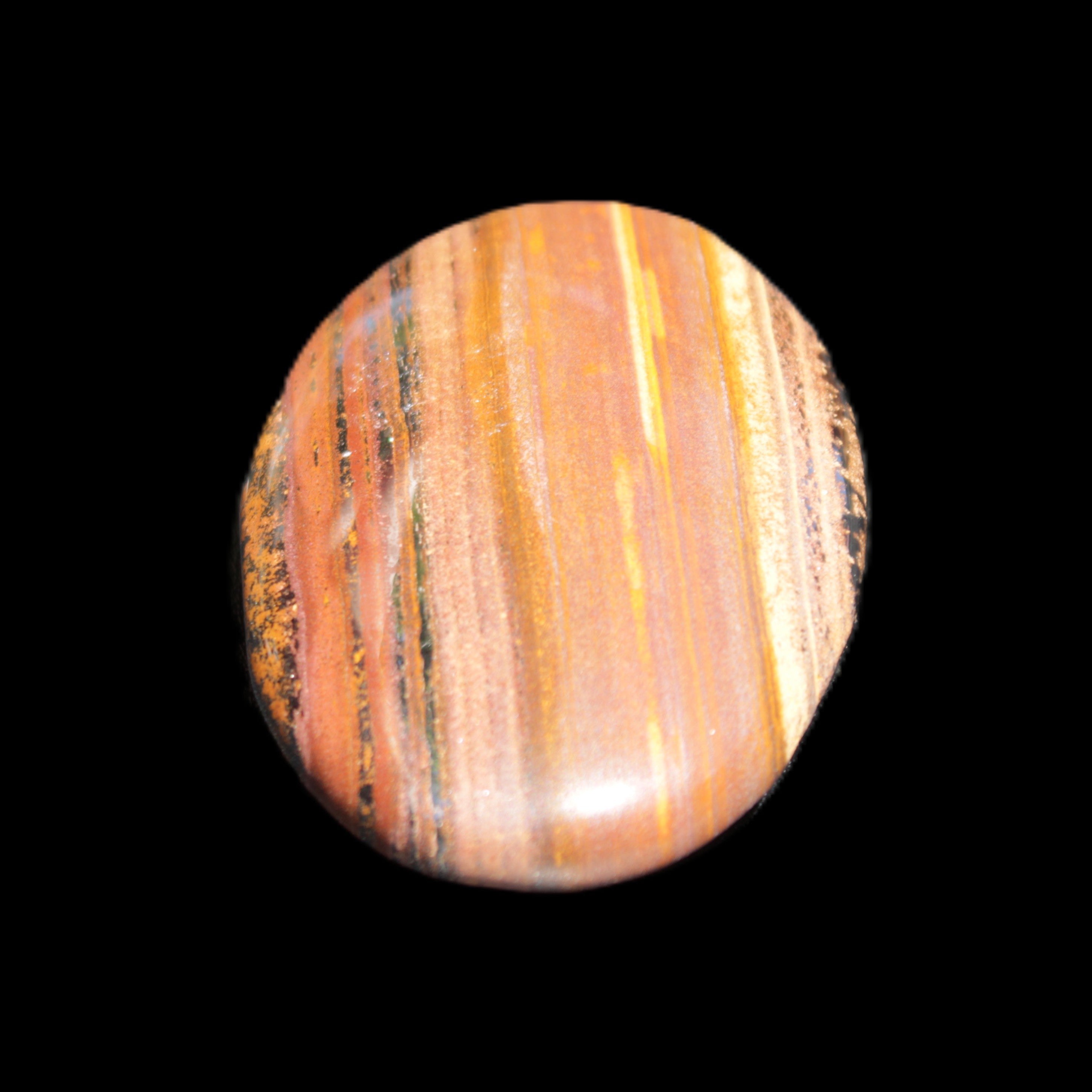 Red Tigers Eye palmstone 57mm 50g in sunlight - Rocks and Things Store