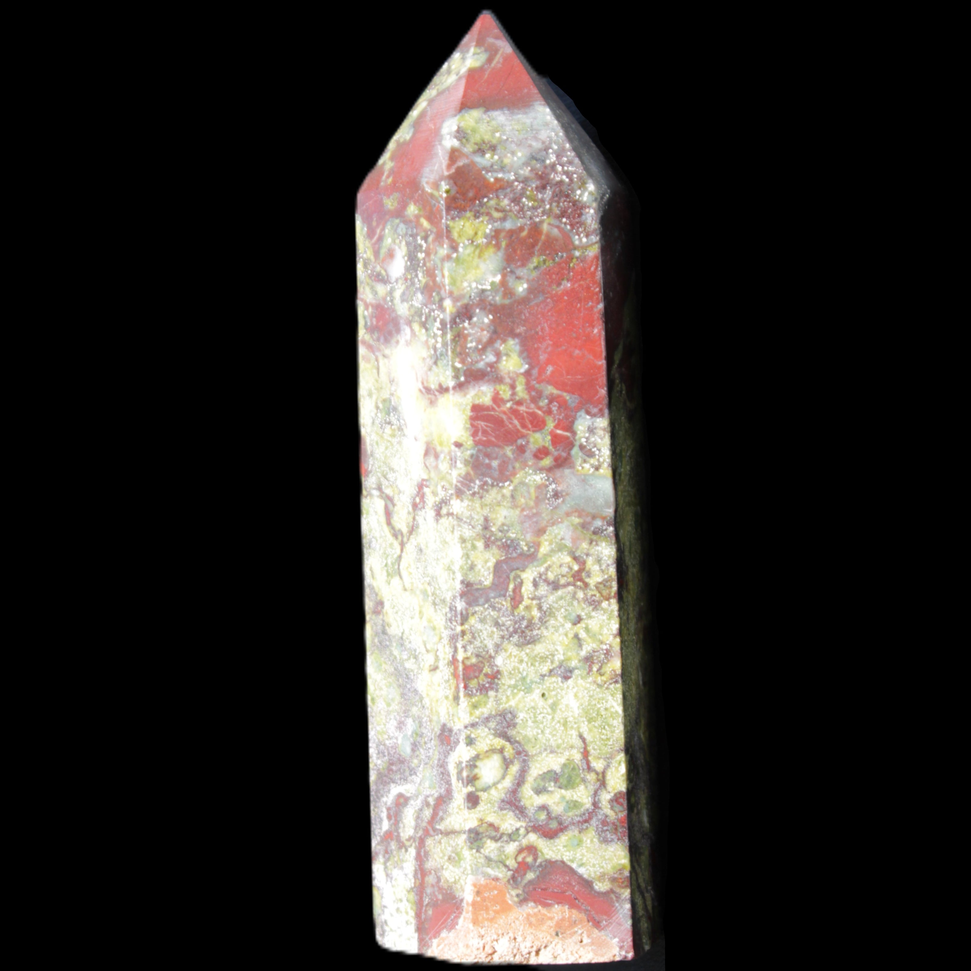 Dragons Blood Stone wand 73mm 70g in sunlight - Rocks and Things Store