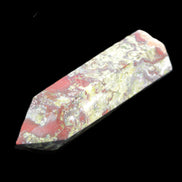 Dragons Blood Stone wand 73mm 70g in sunlight - Rocks and Things Store