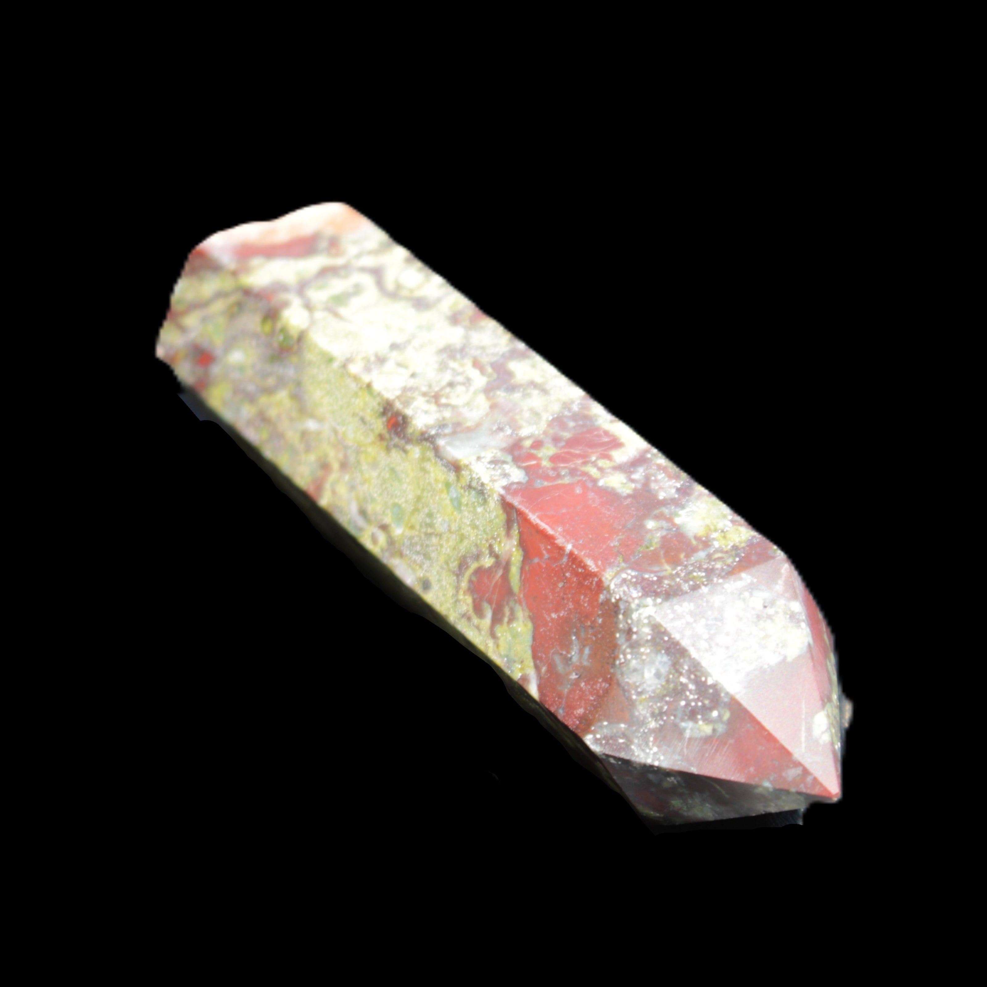 Dragons Blood Stone wand 73mm 70g in sunlight - Rocks and Things Store