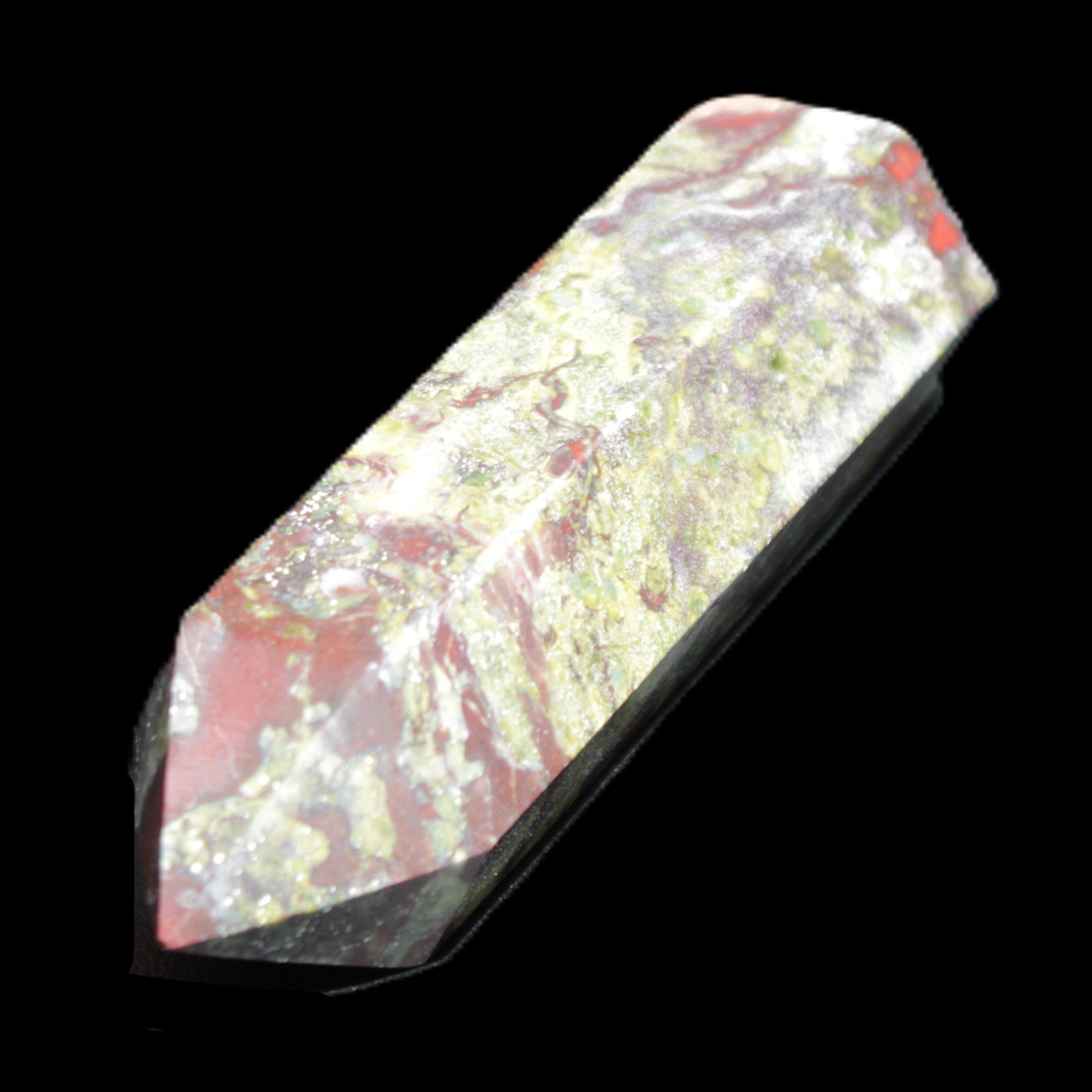 Dragons Blood Stone wand 73mm 70g in sunlight - Rocks and Things Store