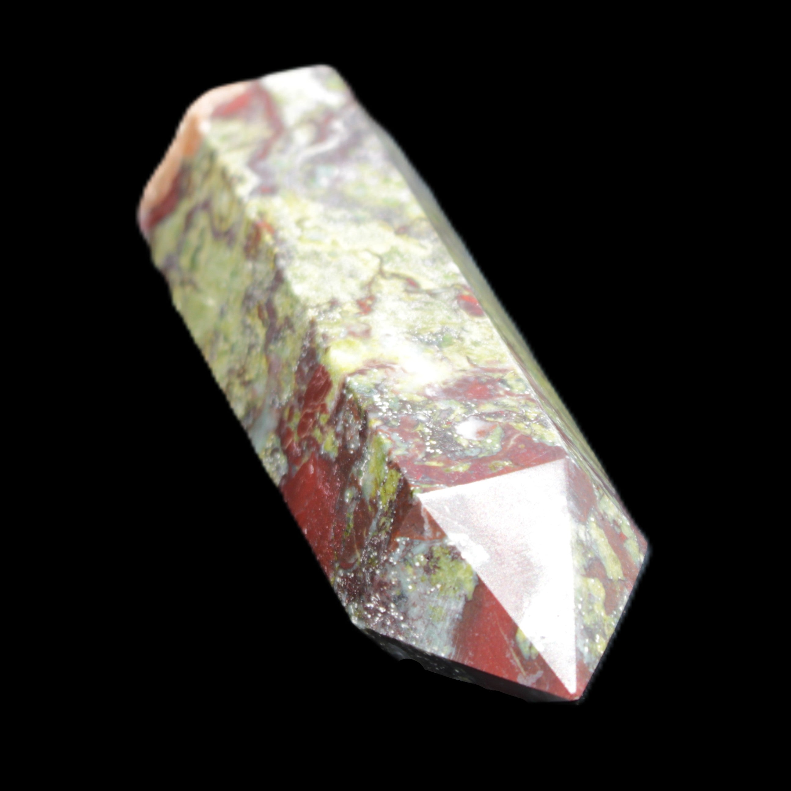 Dragons Blood Stone wand 73mm 70g in sunlight - Rocks and Things Store