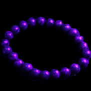 Zoisite medium elastic bracelet 18g in UV light - Rocks and Things Store