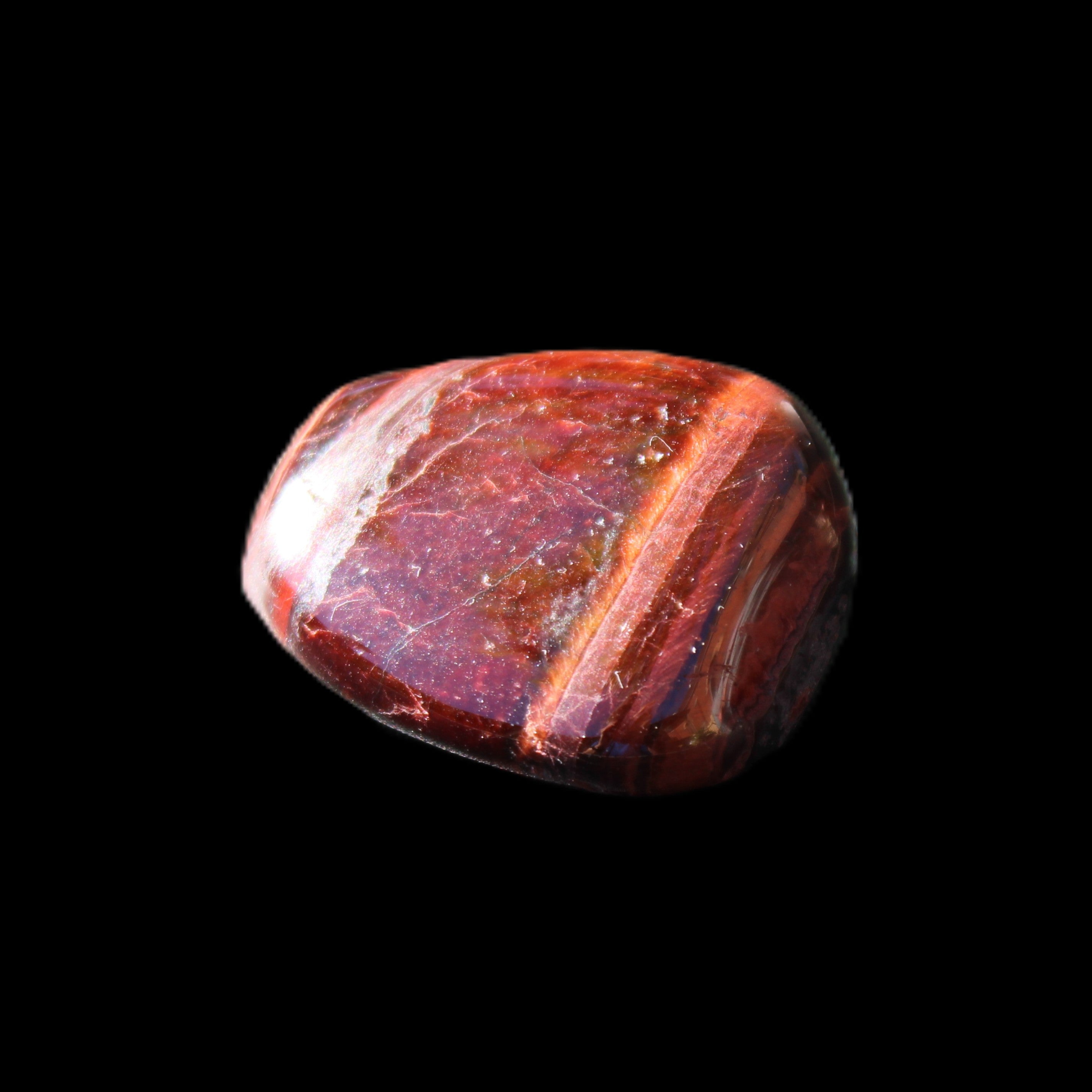 Red Tigers Eye tumbled stone 26/28mm 11/13g in sunlight - Rocks and Things Store