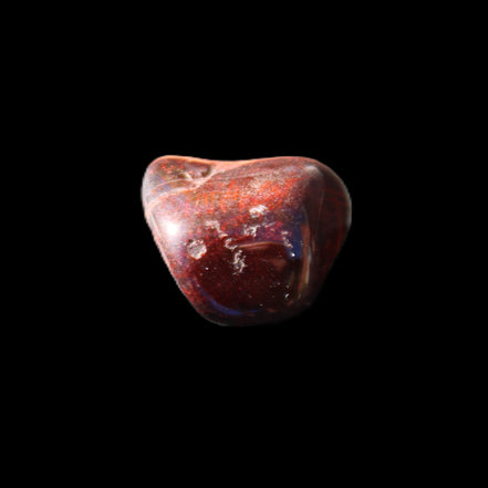 Red Tigers Eye tumbled stone 26/28mm 11/13g in sunlight - Rocks and Things Store