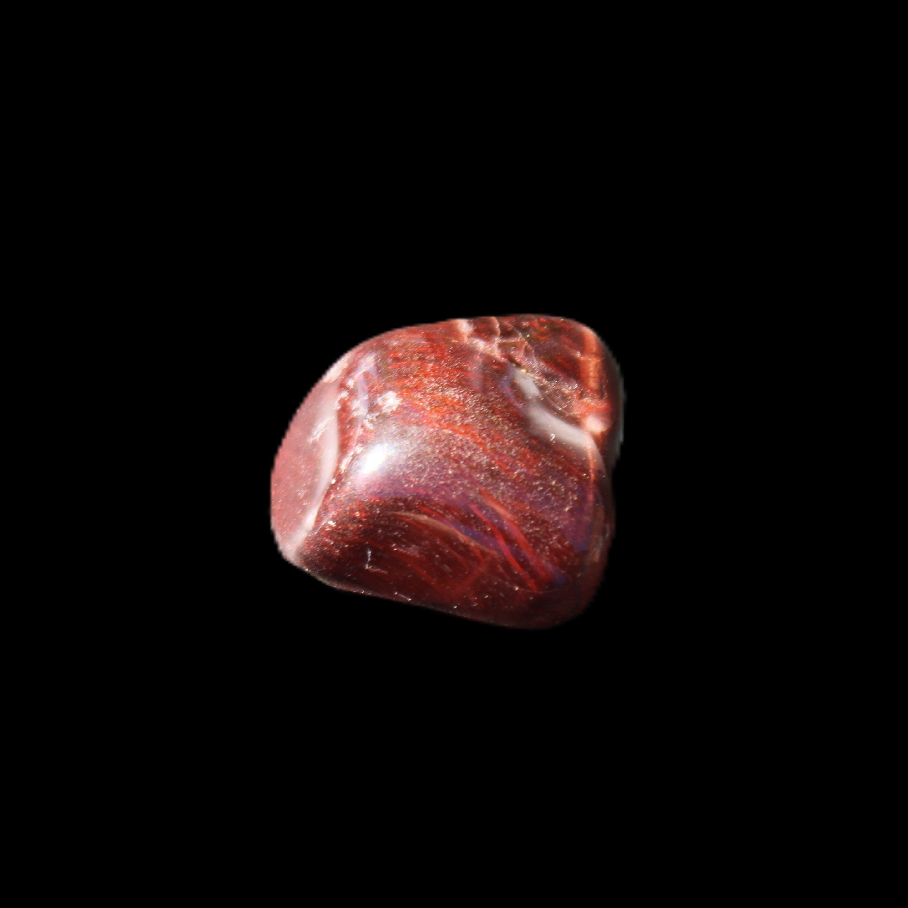 Red Tigers Eye tumbled stone 26/28mm 11/13g in sunlight - Rocks and Things Store