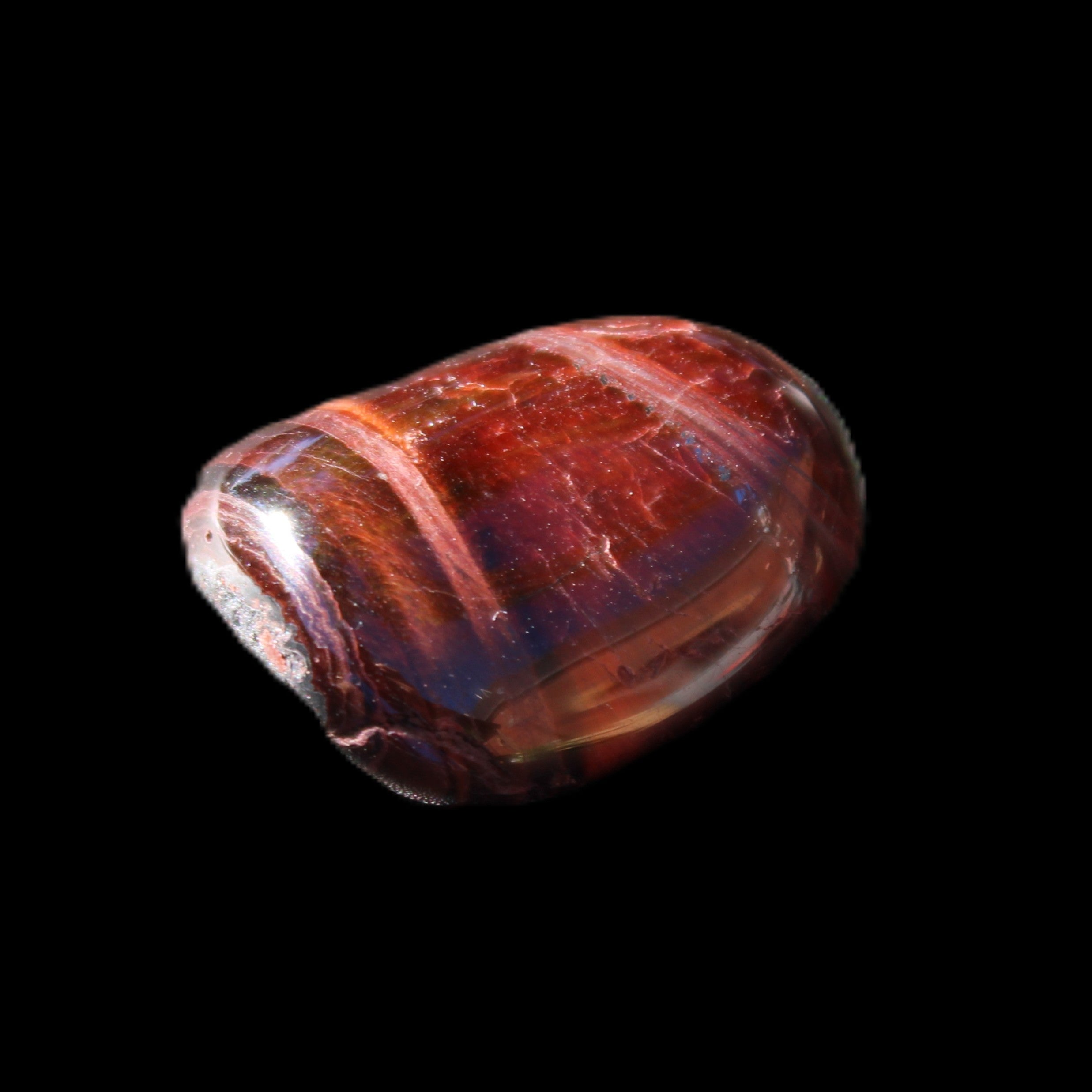 Red Tigers Eye tumbled stone 26/28mm 11/13g in sunlight - Rocks and Things Store