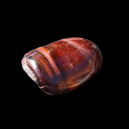 Red Tigers Eye tumbled stone 26/28mm 11/13g in sunlight - Rocks and Things Store