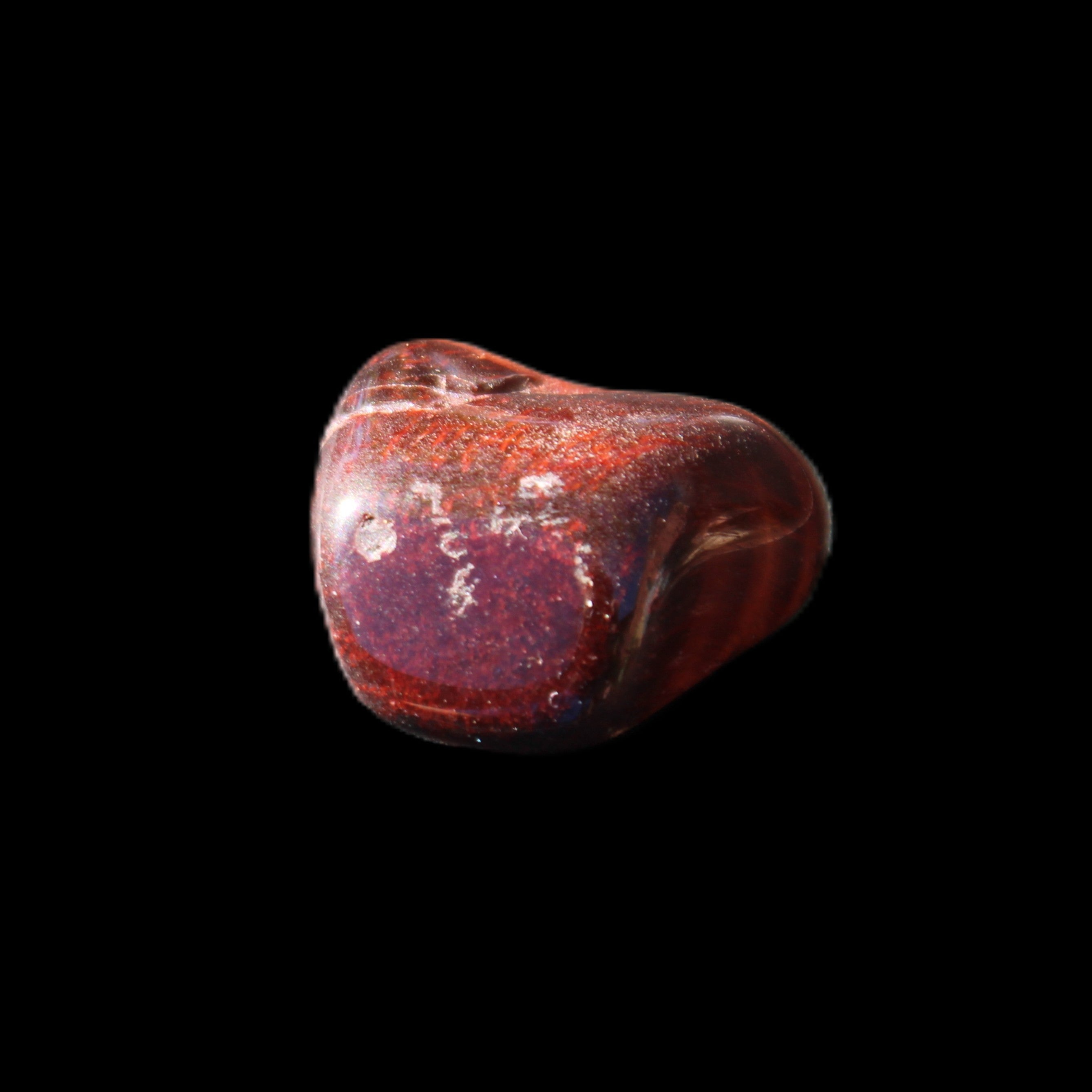 Red Tigers Eye tumbled stone 26/28mm 11/13g in sunlight - Rocks and Things Store