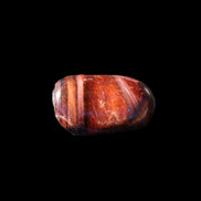Red Tigers Eye tumbled stone 26/28mm 11/13g in sunlight - Rocks and Things Store