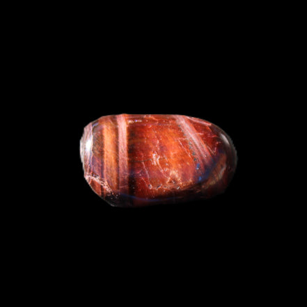 Red Tigers Eye tumbled stone 26/28mm 11/13g in sunlight - Rocks and Things Store