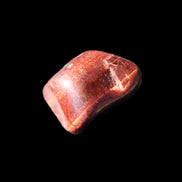 Red Tigers Eye tumbled stone 26/28mm 11/13g in sunlight - Rocks and Things Store