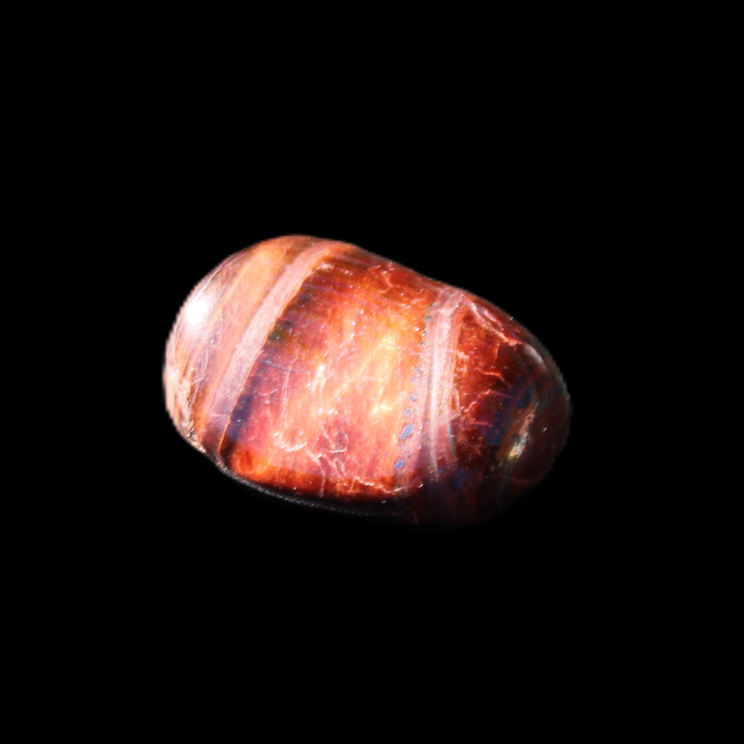 Red Tigers Eye tumbled stone 26/28mm 11/13g in sunlight - Rocks and Things Store