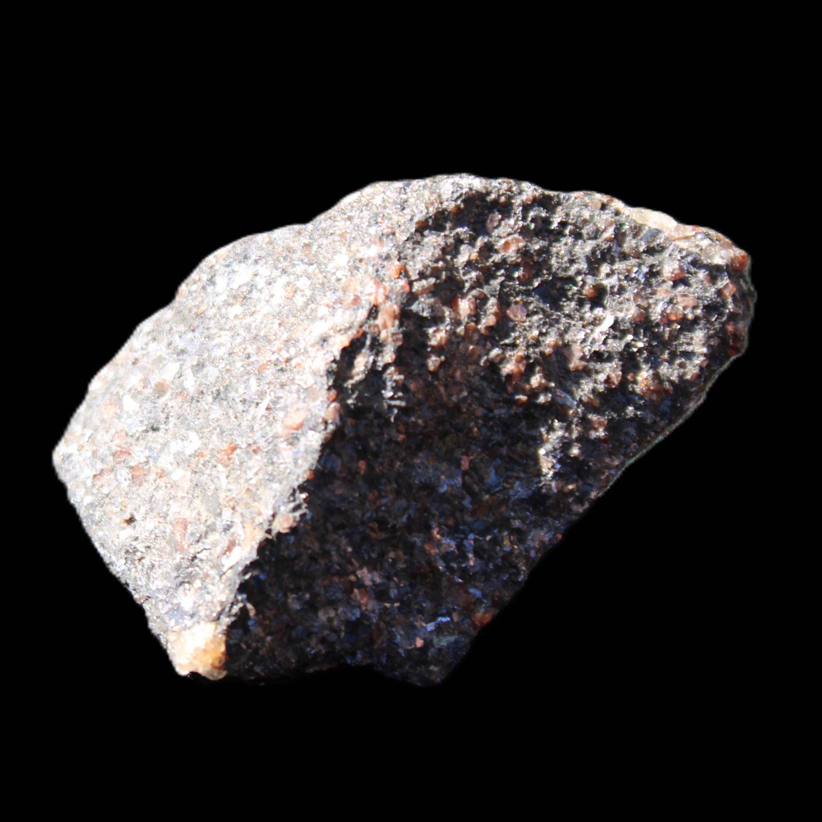 Mineral Ore with Garnet specimen 62*37*30mm 90g in sunlight - Rocks and Things Store