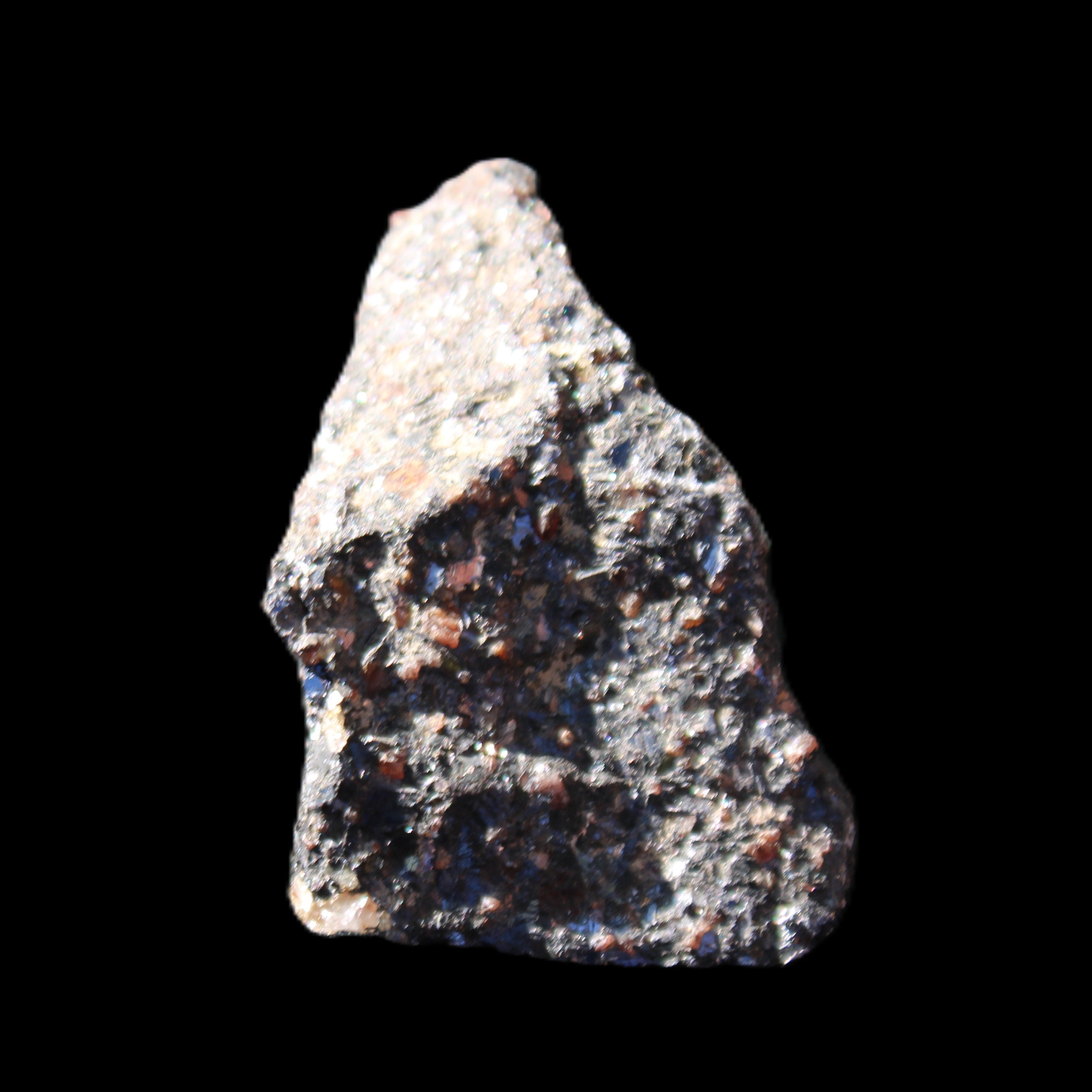 Mineral Ore with Garnet specimen 62*37*30mm 90g in sunlight - Rocks and Things Store