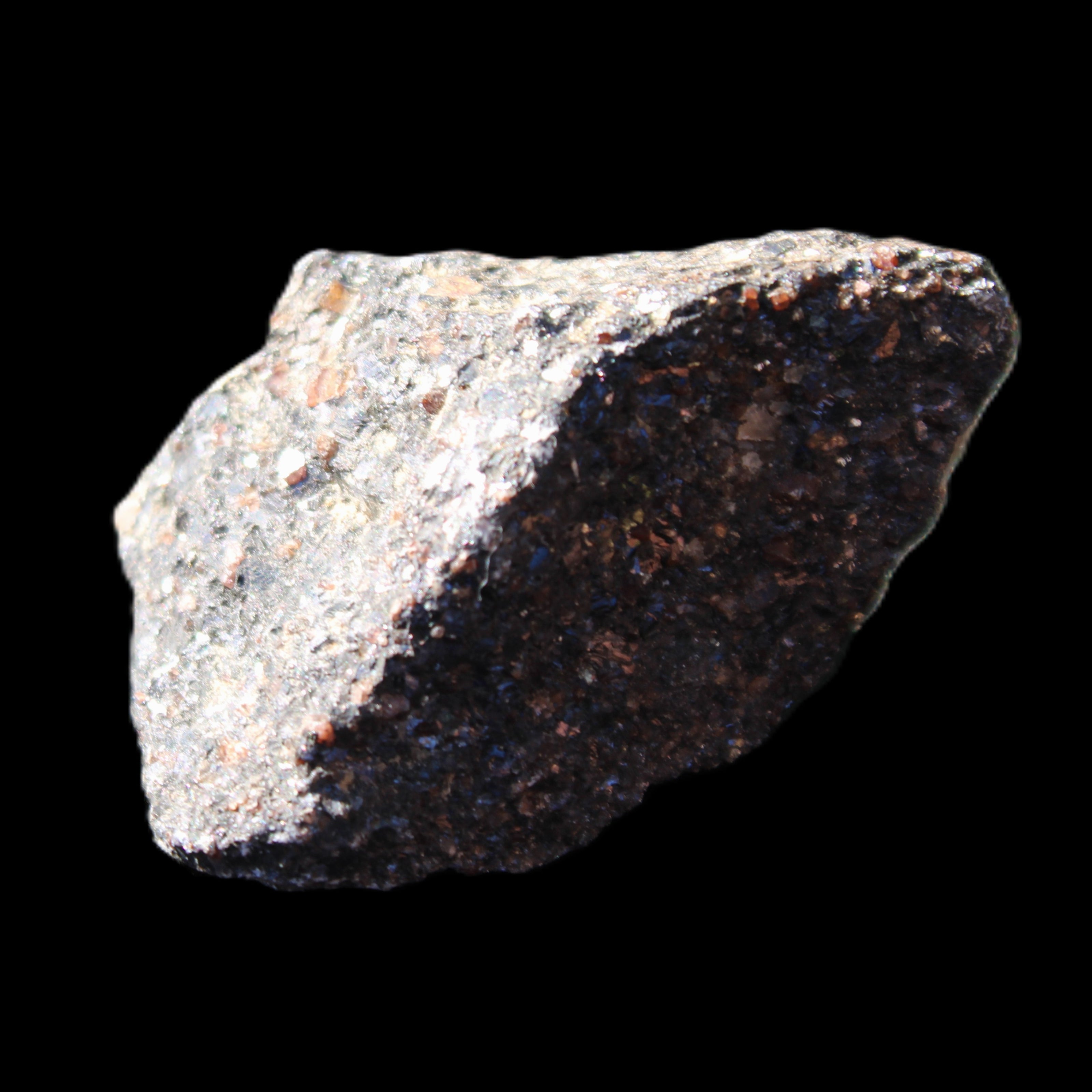 Mineral Ore with Garnet specimen 62*37*30mm 90g in sunlight - Rocks and Things Store