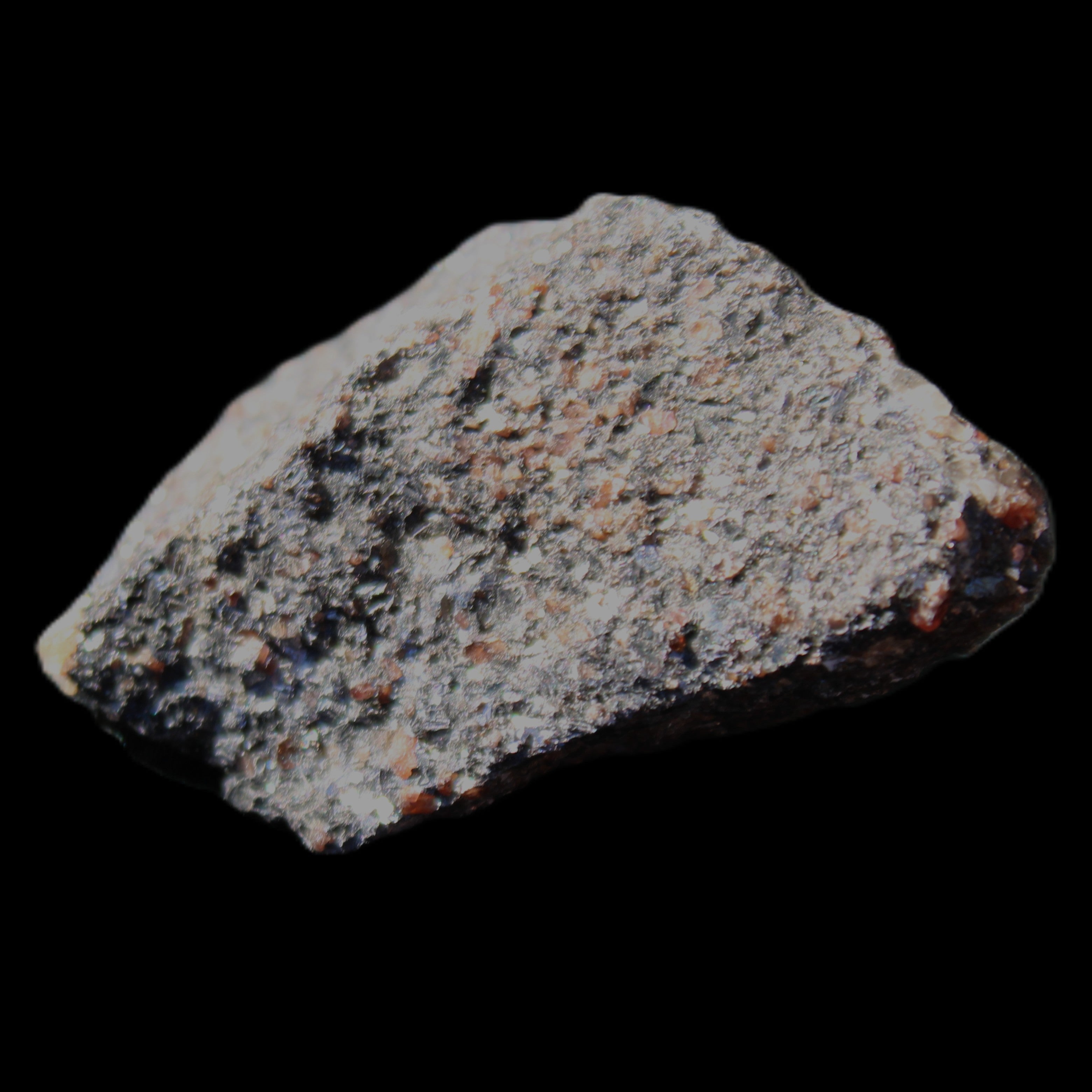 Mineral Ore with Garnet specimen 62*37*30mm 90g in sunlight - Rocks and Things Store