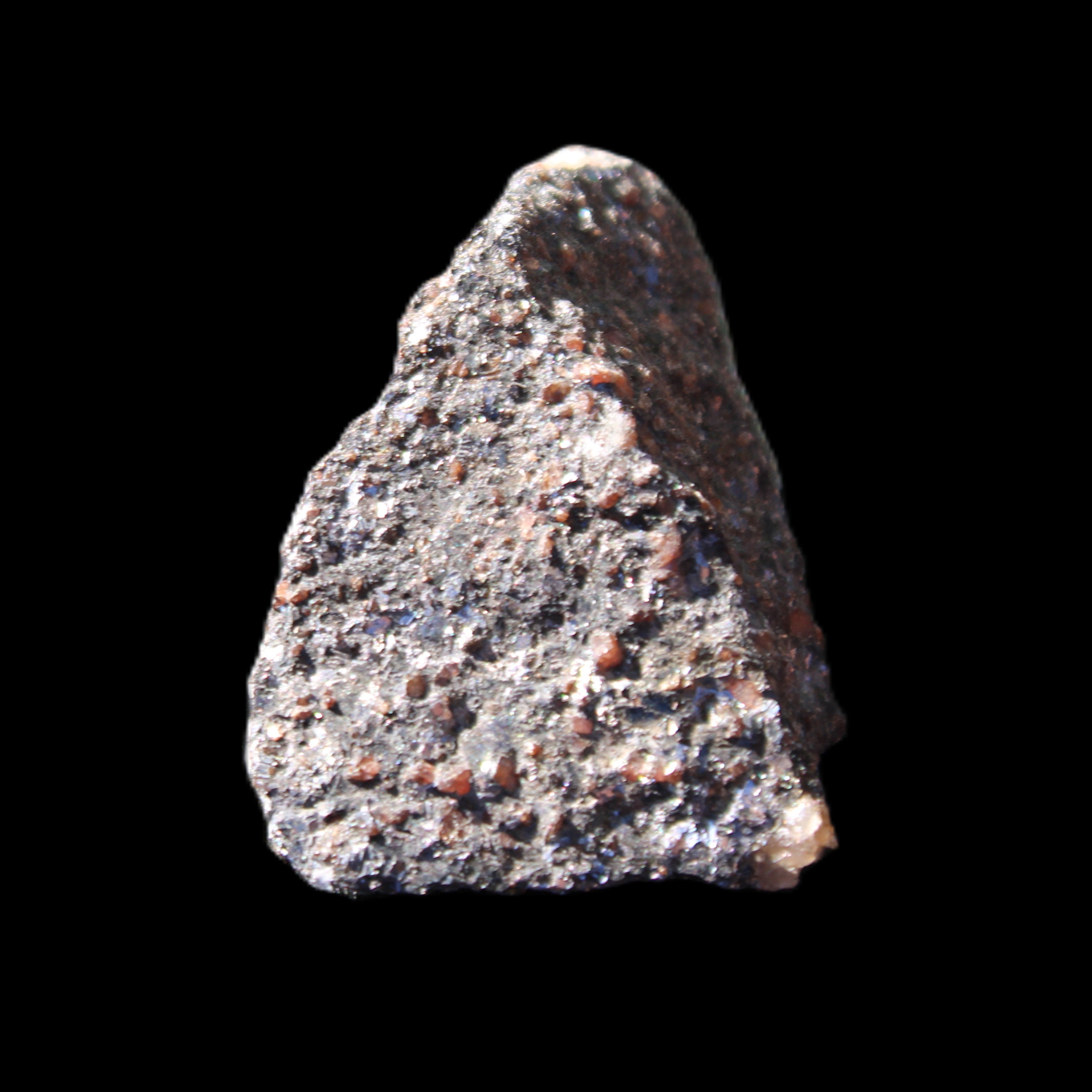 Mineral Ore with Garnet specimen 62*37*30mm 90g in sunlight - Rocks and Things Store