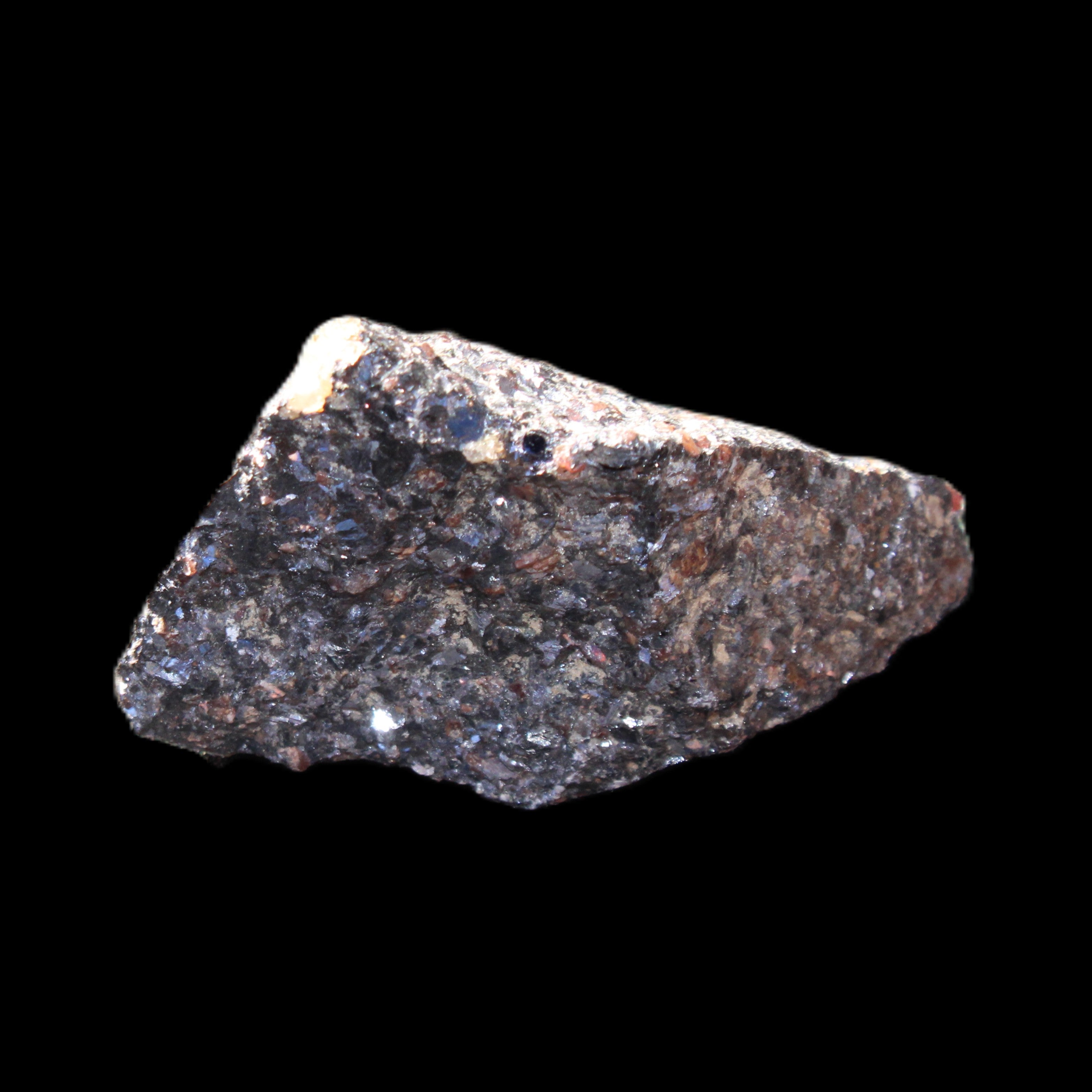 Mineral Ore with Garnet specimen 62*37*30mm 90g in sunlight - Rocks and Things Store