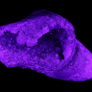 Pink and Violet Amethyst slipper geode 260*190*115mm 3500g in UV light - Rocks and Things Store