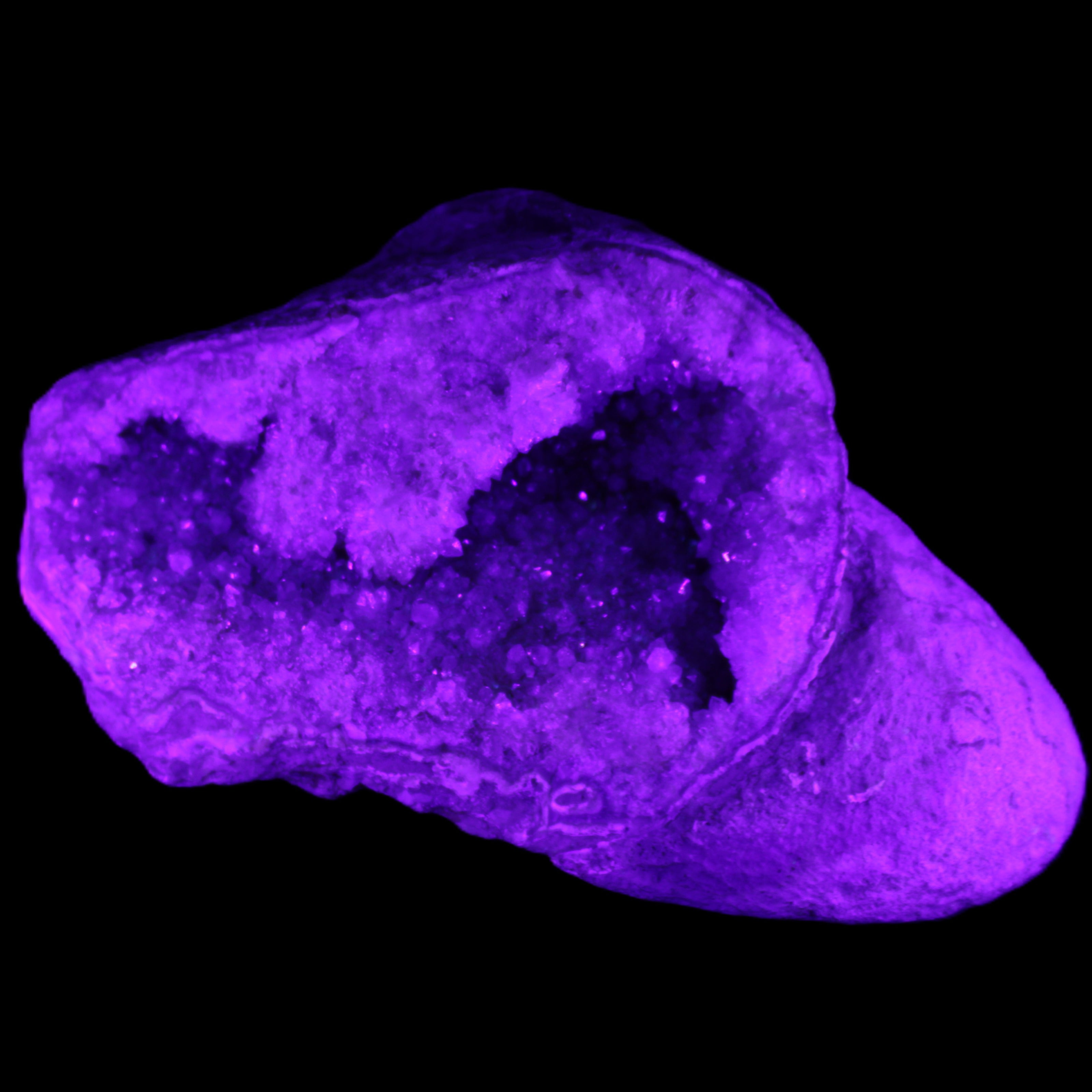 Pink and Violet Amethyst slipper geode 260*190*115mm 3500g in UV light - Rocks and Things Store