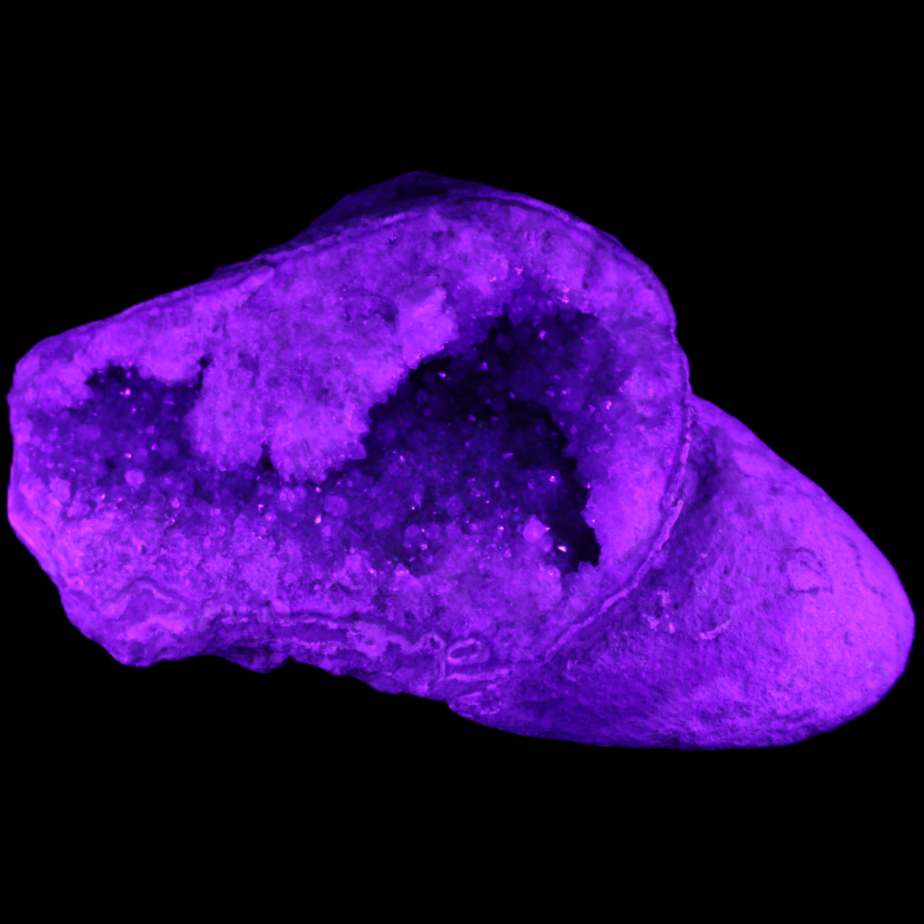 Pink and Violet Amethyst slipper geode 260*190*115mm 3500g in UV light - Rocks and Things Store