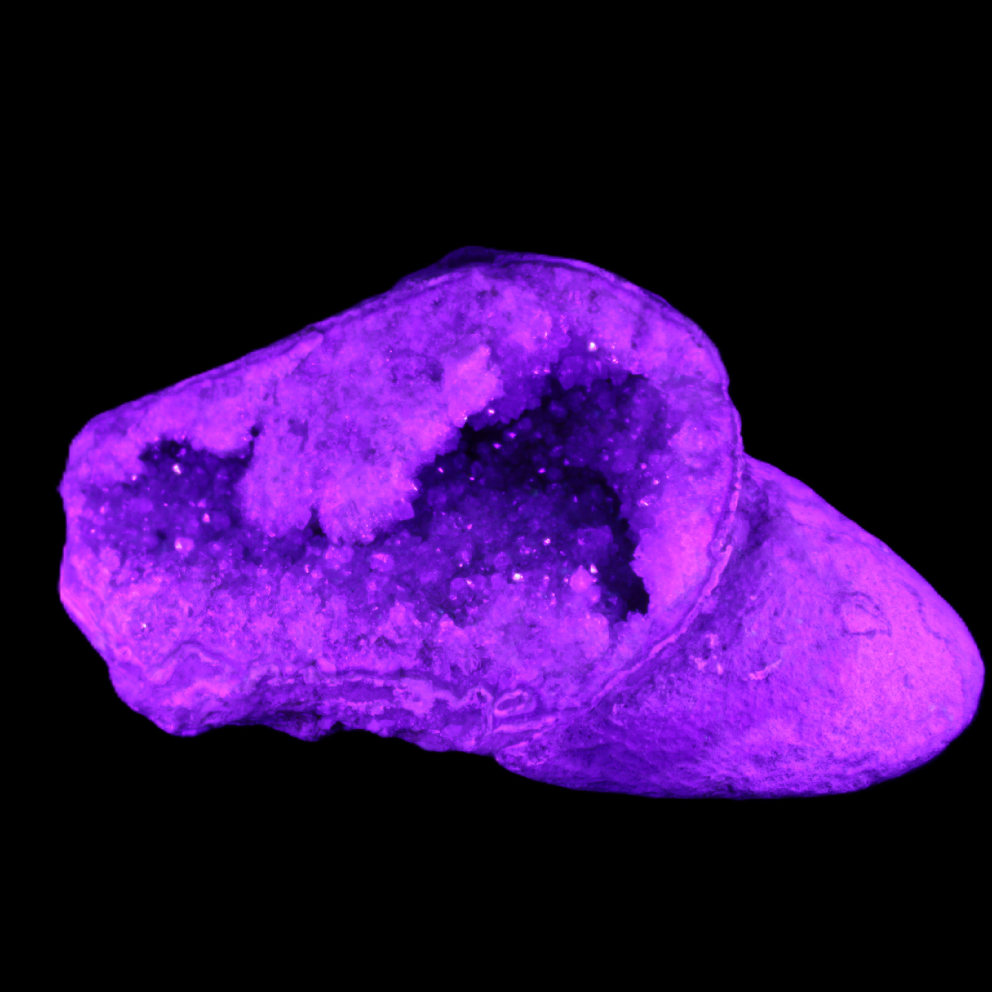 Pink and Violet Amethyst slipper geode 260*190*115mm 3500g in UV light - Rocks and Things Store